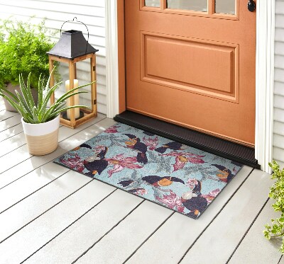 Front door mat Toucans among flowers